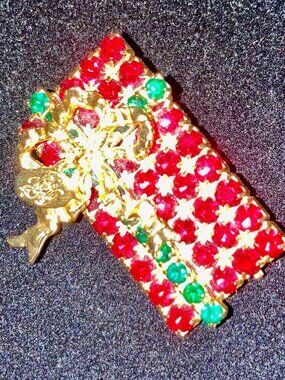 KIRKS FOLLY SPARKLING RED AND GREEN RHINESTONE BROOCH-PRESENT ALL WRAPPED UP
